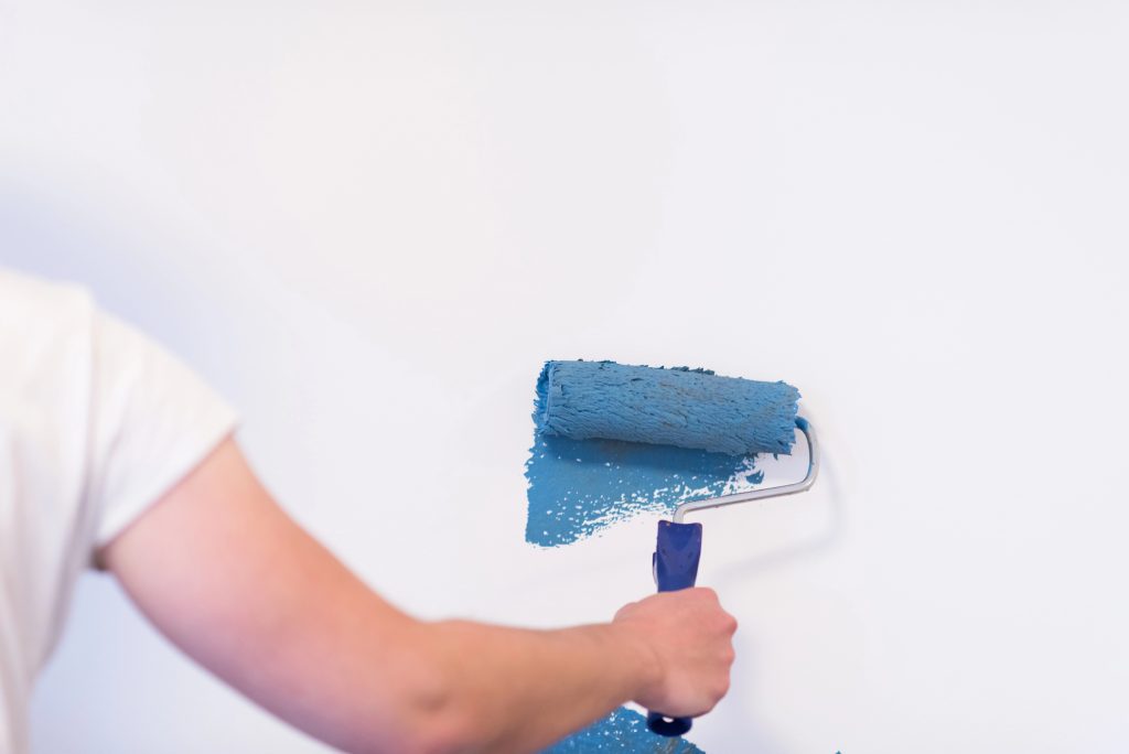 Decorator's hand painting wall